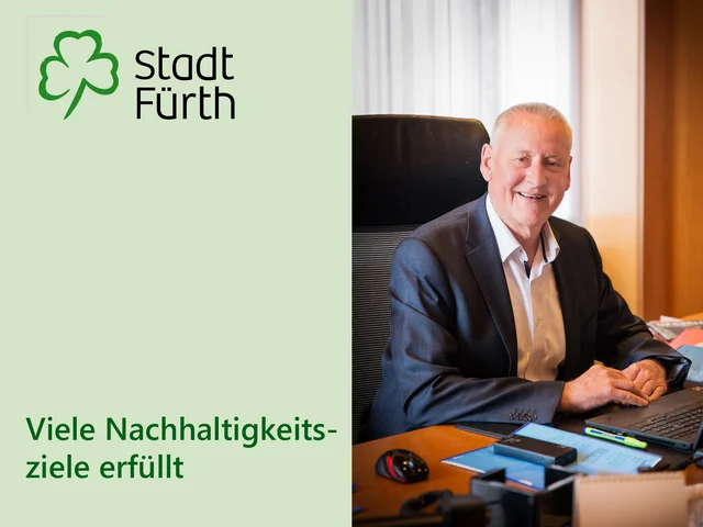 Schriftgrafik mit dem Logo der Stadt Fürth, Text „Viele Nachhaltigkeitsziele erfüllt“ und Foto vom OB, der am Schreibtisch sitzt. Klick öffnet die Meldung.