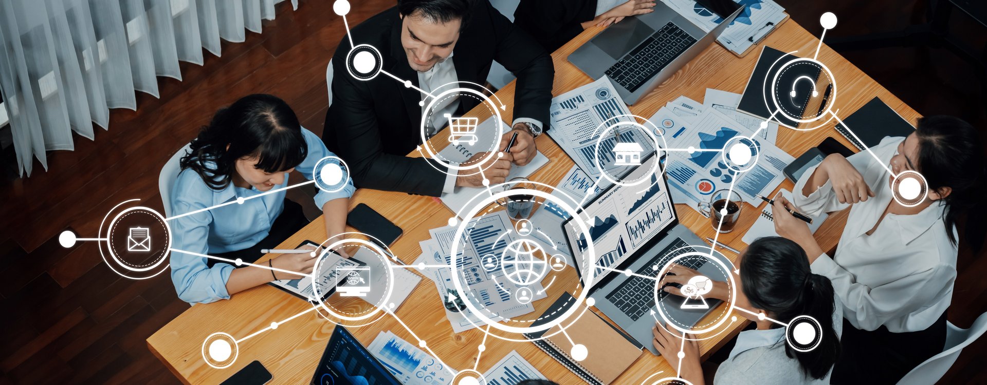 Collaborative Team Meeting with Digital Marketing Strategies and Business Analytics on Display in a Modern Office Environment. Amity