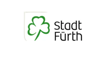 Logo: Grünes Kleeblatt neben dem Schriftzug 'Stadt Fürth'