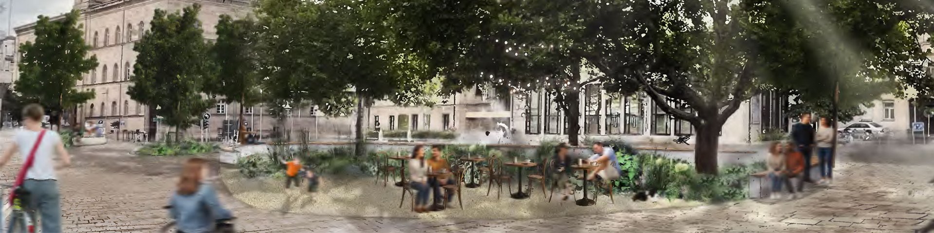 Begrünter Königsplatz mit Rathaus im Hintergrund