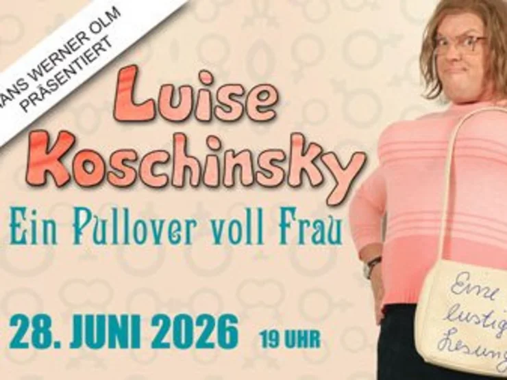Hans Werner Olm als Frau verkleidet mit rosa Pullover und einem Schild mit handgeschriebener Notiz