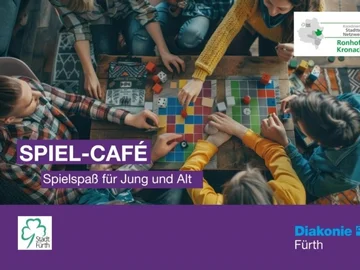 Mehrere Personen sitzen an einem Tisch und spielen gemeinsam Brettspiele